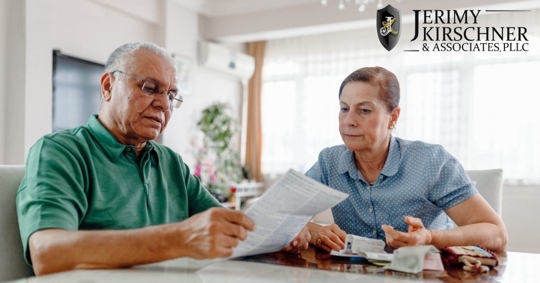 Older couple reviewing documents